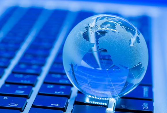 Blogger writing guest post on laptop to build backlinks and improve SEO rankings